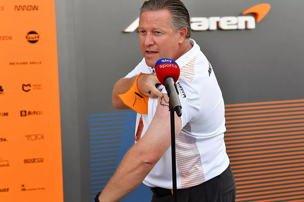 Zak Brown, CEO, McLaren Racing, shows off his new Monza tattoo