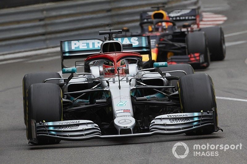 Lewis Hamilton, Mercedes AMG F1 W10, leads Max Verstappen, Red Bull Racing RB15