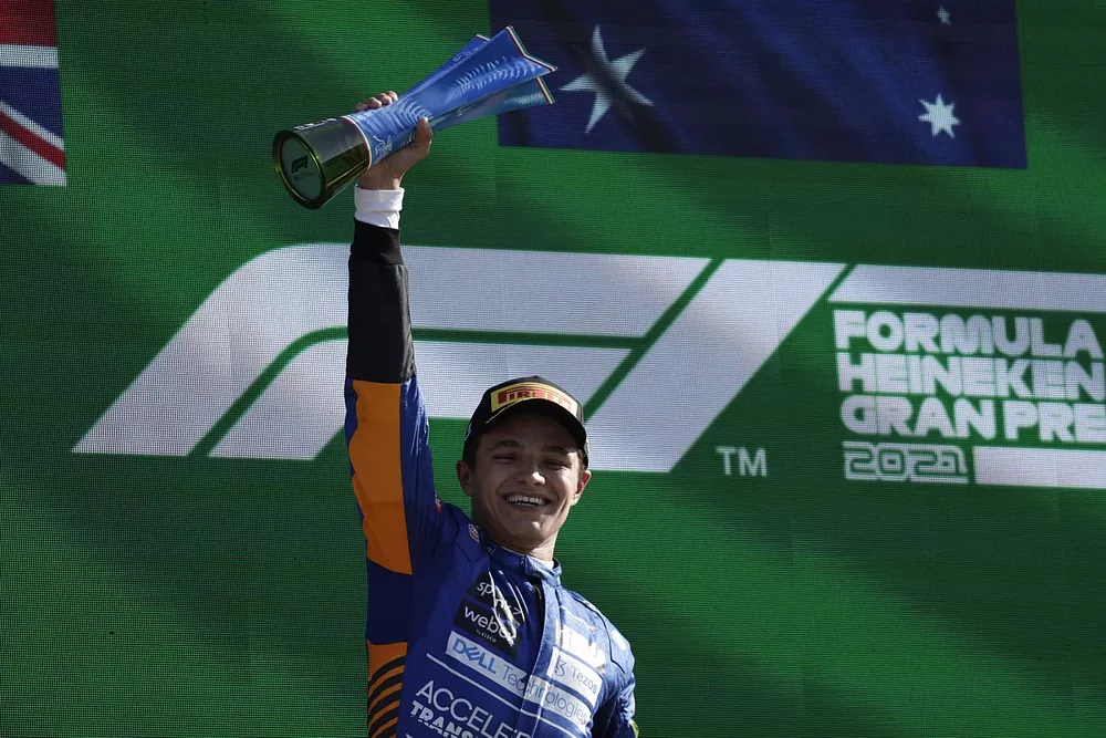 Lando Norris, McLaren, 2nd position, celebrates on the podium