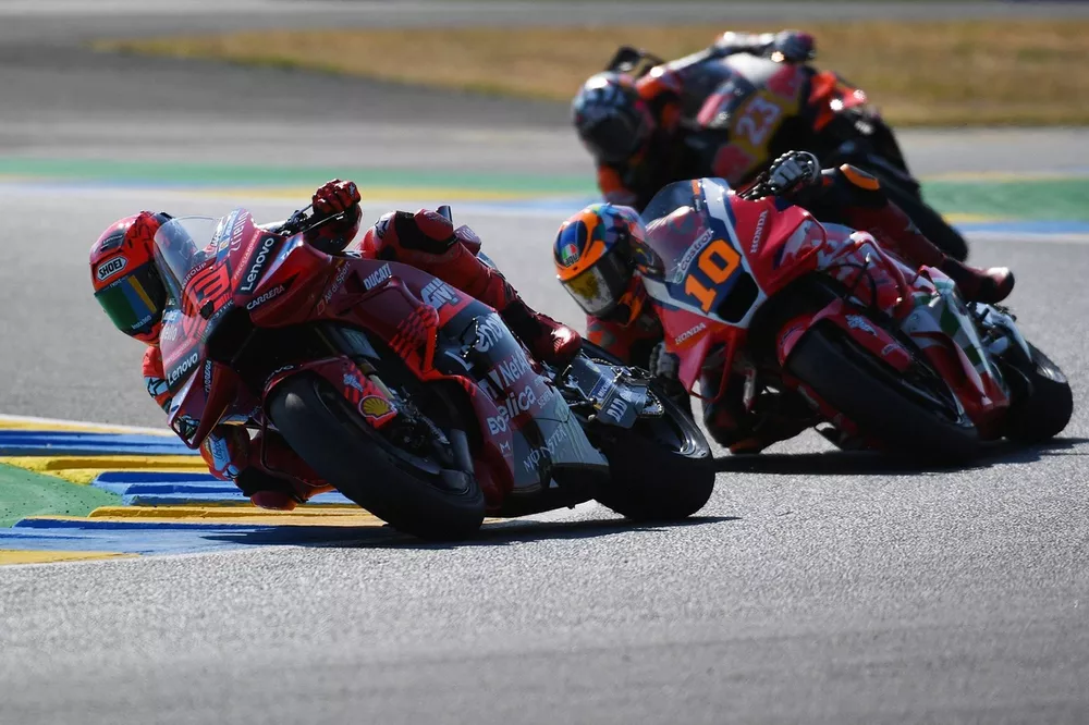 Marc Marquez, Ducati Team, Luca Marini, Honda HRC