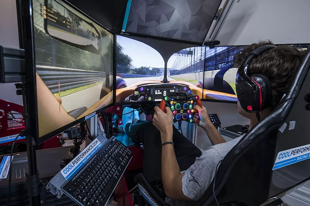 Lando Norris drives a lap of the Interlagos circuit on his home simulator