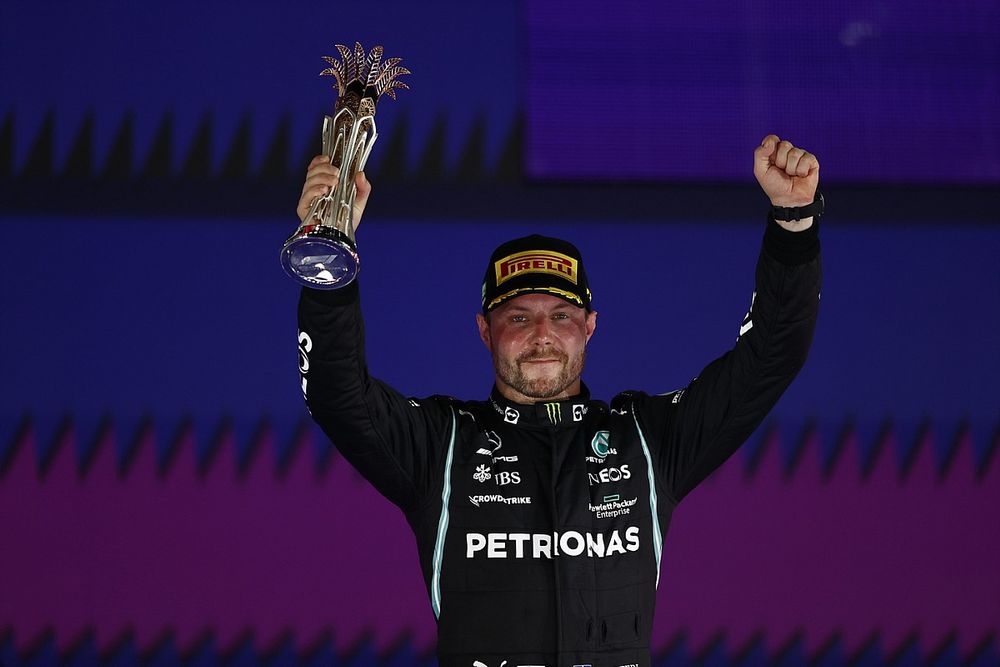 Valtteri Bottas, Mercedes, 3rd position, lifts his trophy