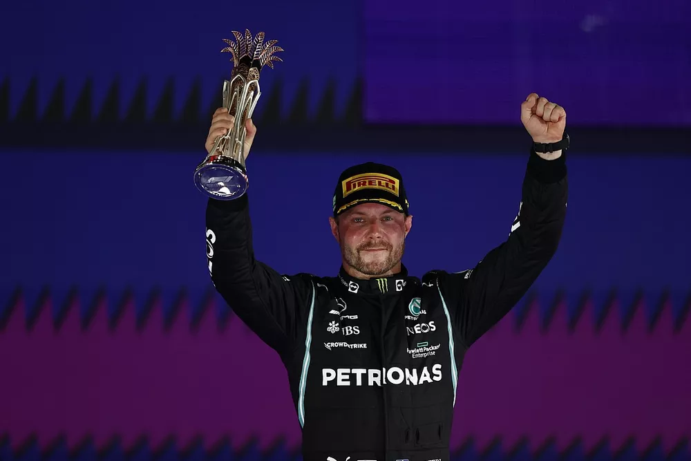 Valtteri Bottas, Mercedes, 3rd position, lifts his trophy