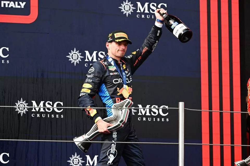 Max Verstappen, Red Bull Racing, 1st position, celebrates on the podium 