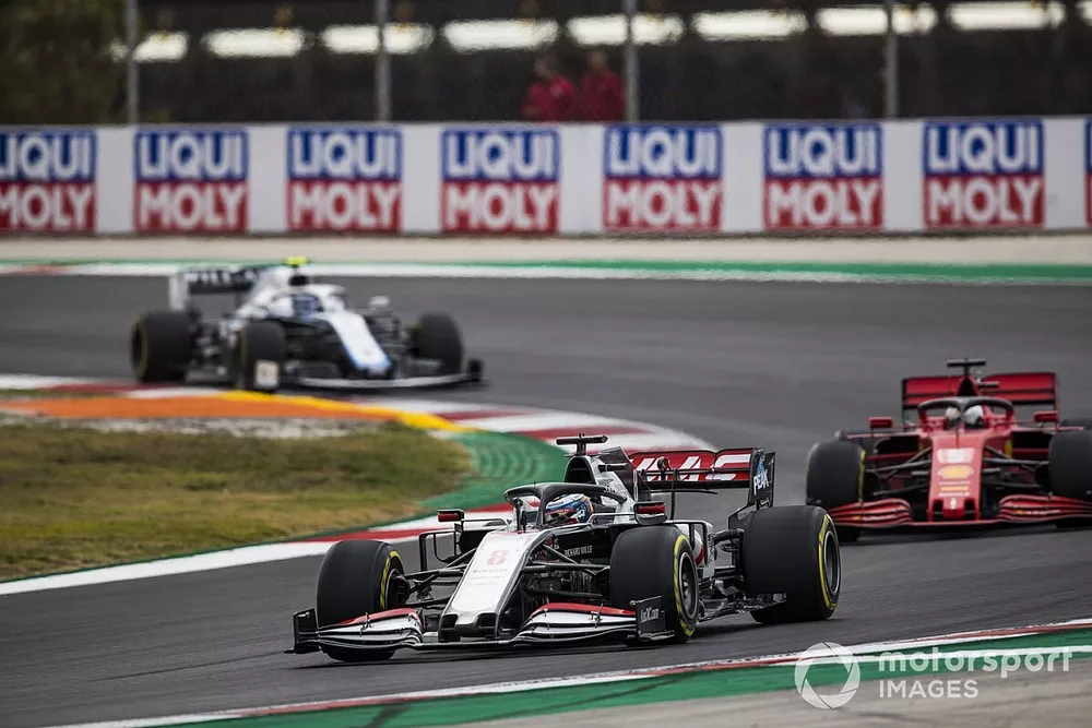 Romain Grosjean, Haas VF-20, Sebastian Vettel, Ferrari SF1000, and Nicholas Latifi, Williams FW43