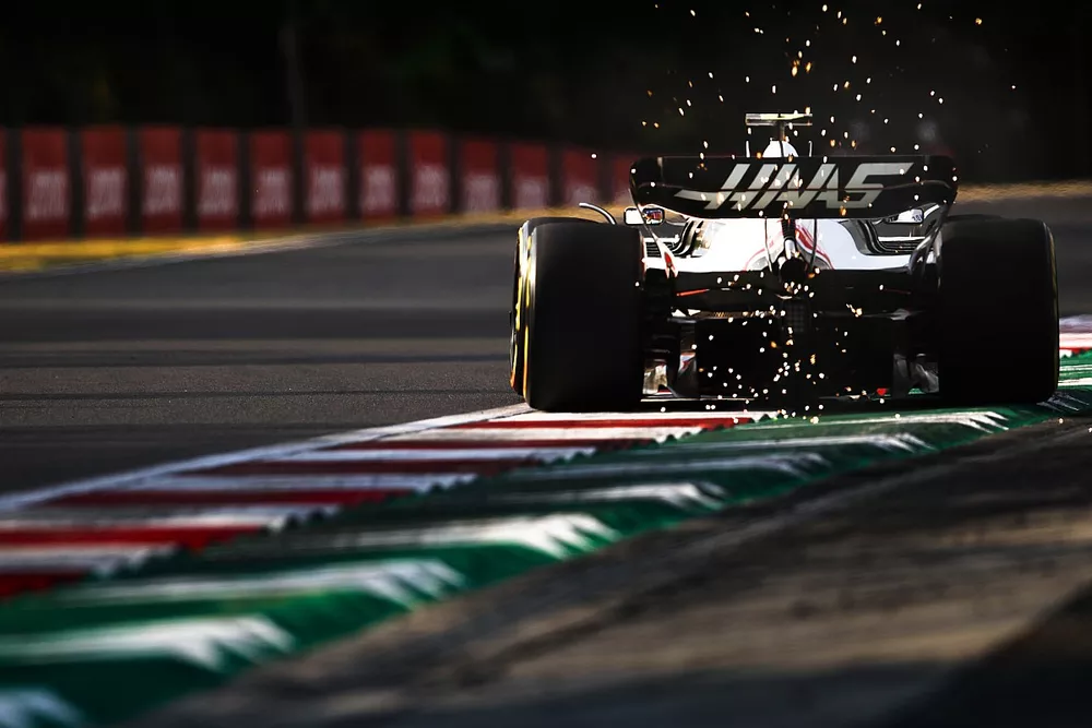 Mick Schumacher, Haas VF-22, kicks up some sparks