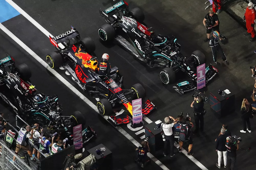 Lewis Hamilton, Mercedes, 1st position, Max Verstappen, Red Bull Racing, 2nd position, and Valtteri Bottas, Mercedes, 3rd position, arrive in Parc Ferme
