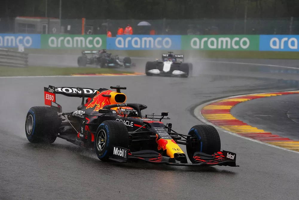 Max Verstappen, Red Bull Racing RB16B, George Russell, Williams FW43B, and Sir Lewis Hamilton, Mercedes W12