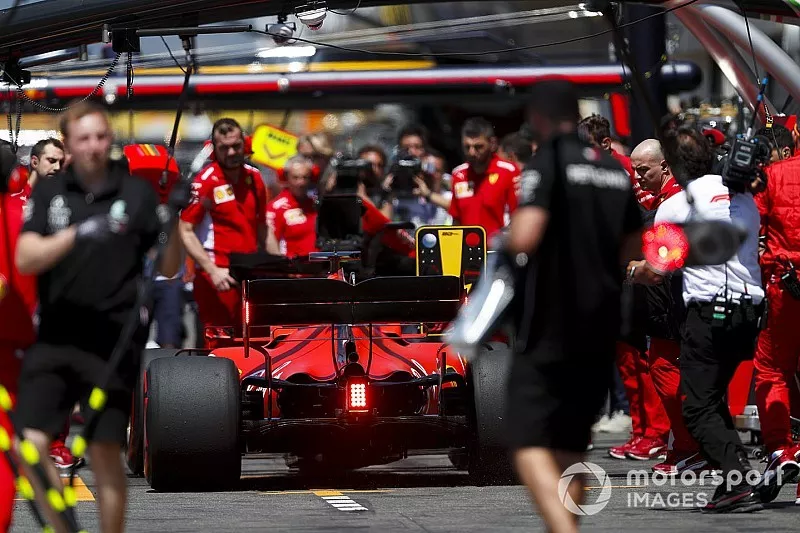 Sebastian Vettel, Ferrari SF90, in the pit lane