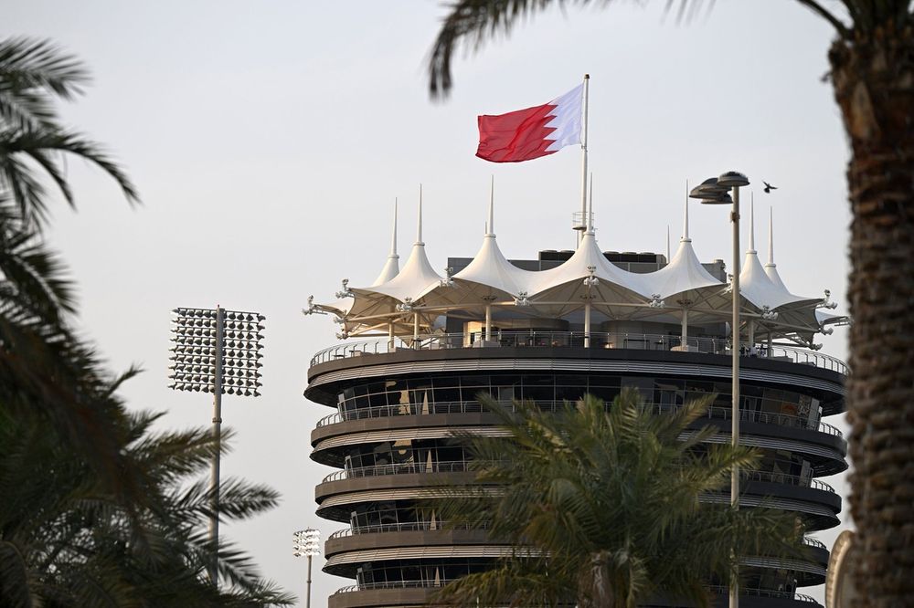 The Bahrain flag flies over the Sakhir Tower