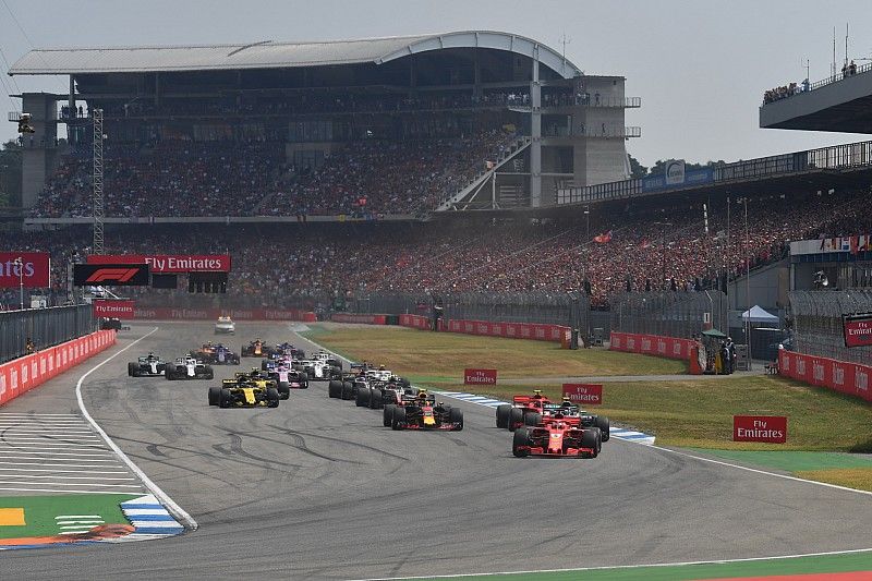 Sebastian Vettel, Ferrari SF71H leads at the start of the race
