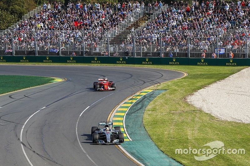Lewis Hamilton, Mercedes AMG F1 W08, leads Sebastian Vettel, Ferrari SF70H