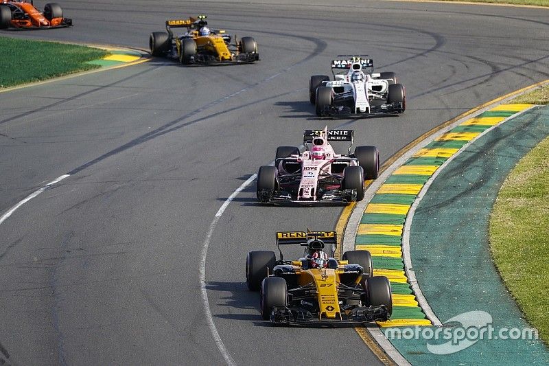 Nico Hulkenberg, Renault Sport F1 Team RS17, leads Esteban Ocon, Force India VJM10, Lance Stroll, Williams FW40, and Jolyon Palmer, Renault Sport F1 Team RS17