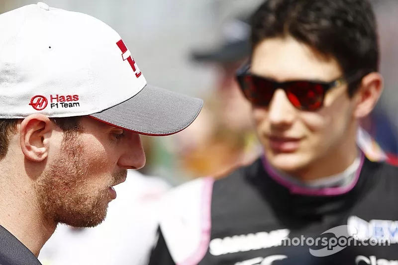 Romain Grosjean, Haas F1 Team, et Esteban Ocon, Force India