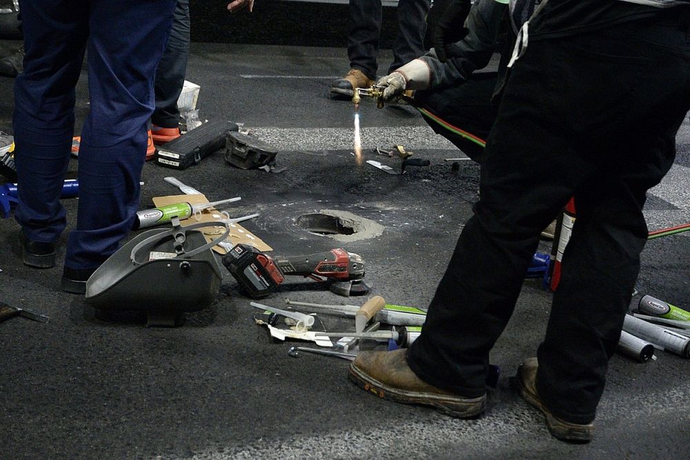 Work and discussion is undertaken to fix the loose manhole covers on track