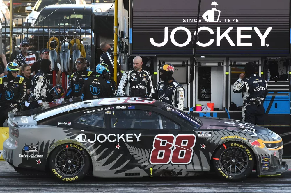 Shane van Gisbergen climbs out of car, Trackhouse Racing Chevrolet 