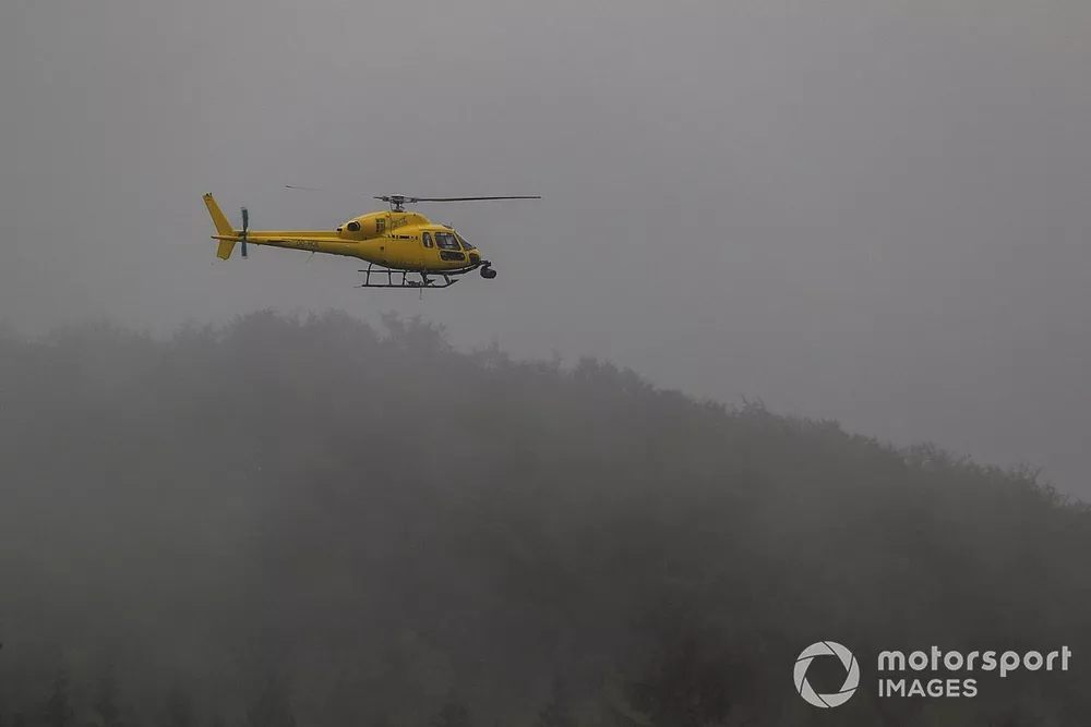 A helicopter flying over the circuit
