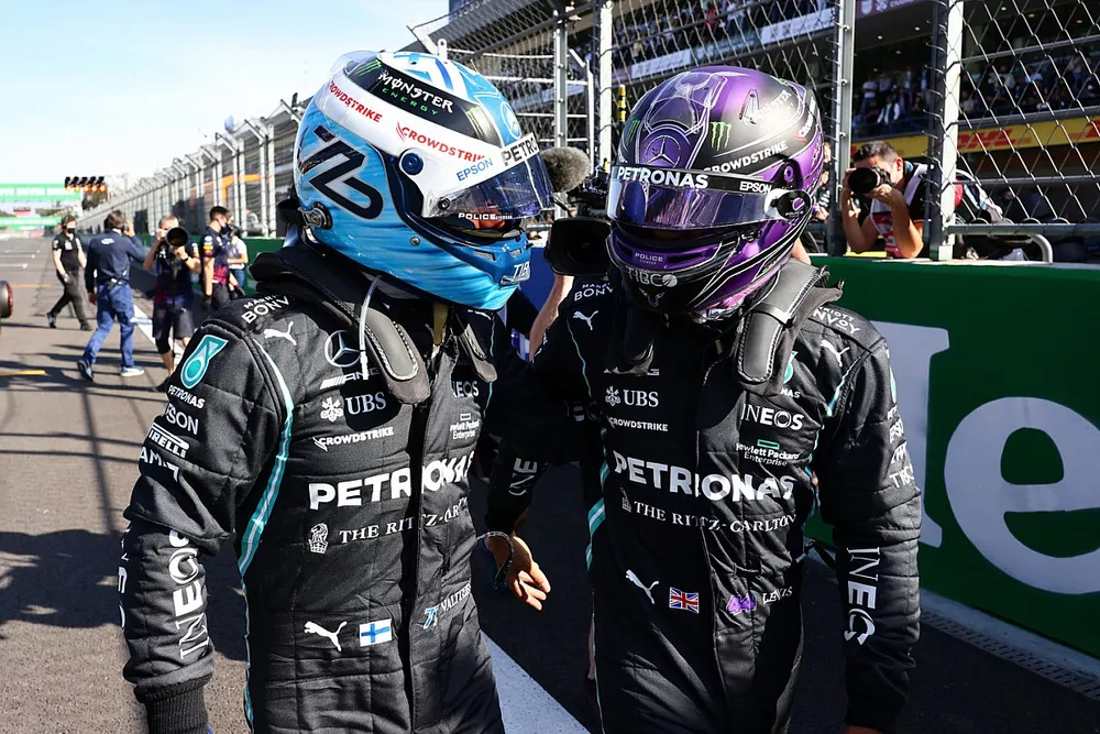 Pole man Valtteri Bottas, Mercedes, and Lewis Hamilton, Mercedes, congratulate each other in Parc Ferme