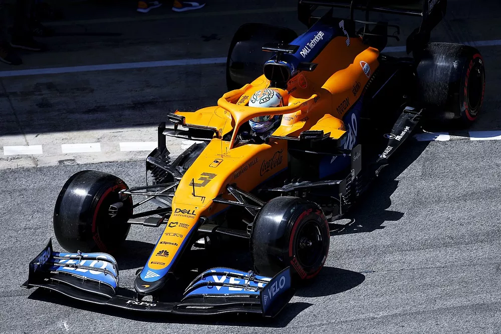 Daniel Ricciardo, McLaren MCL35M, leaves the garage