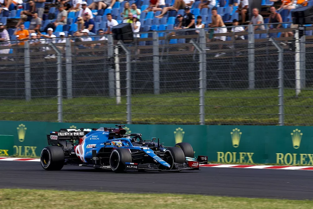 Fernando Alonso, Alpine A521, battles with Lewis Hamilton, Mercedes W12