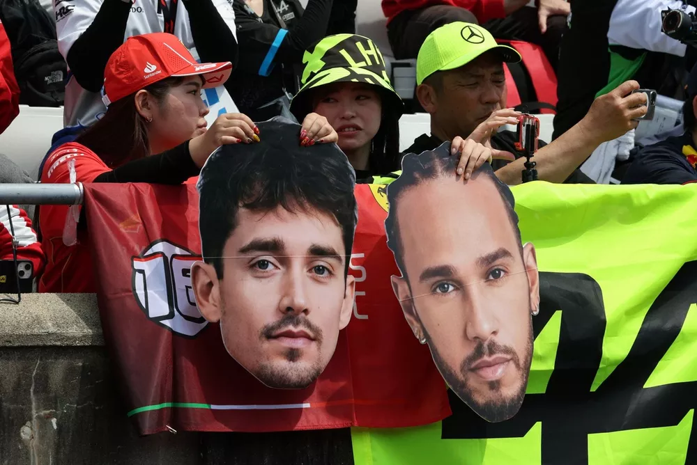 Fans supporting Charles Leclerc, Scuderia Ferrari, Lewis Hamilton, Mercedes-AMG F1 Team