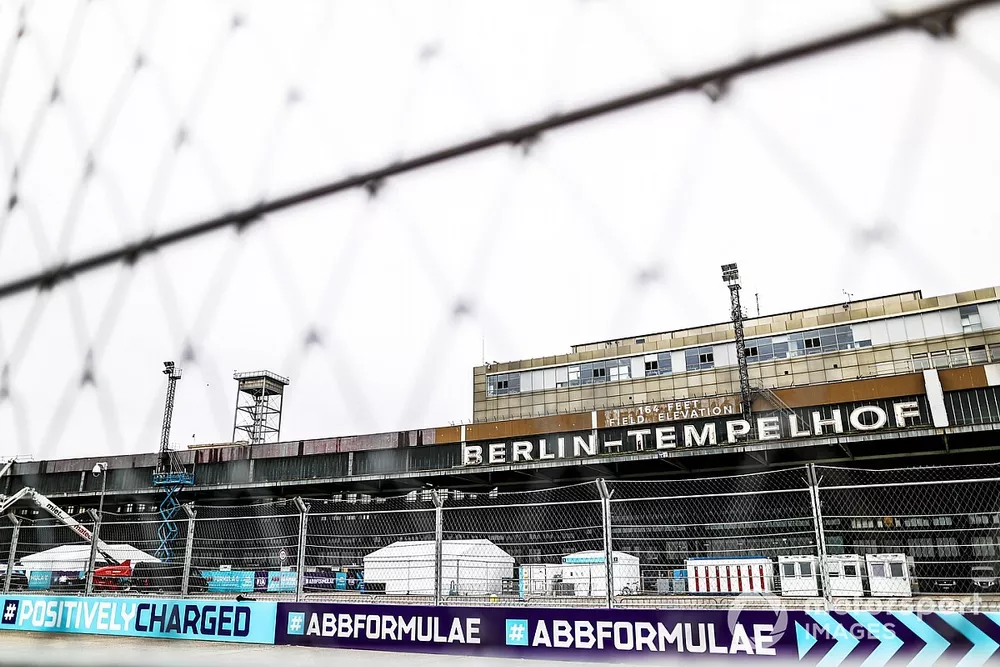 A view across the track with one of the Berlin-Tempelhof buildings in the background