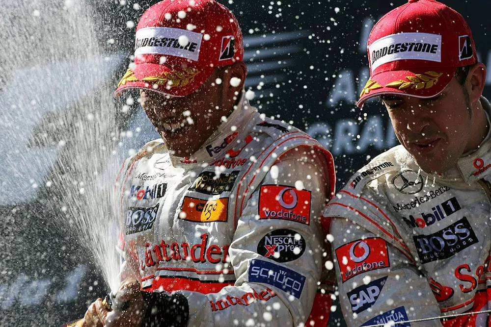 Third place Lewis Hamilton, McLaren and second place Fernando Alonso, McLaren celebrates on the podium