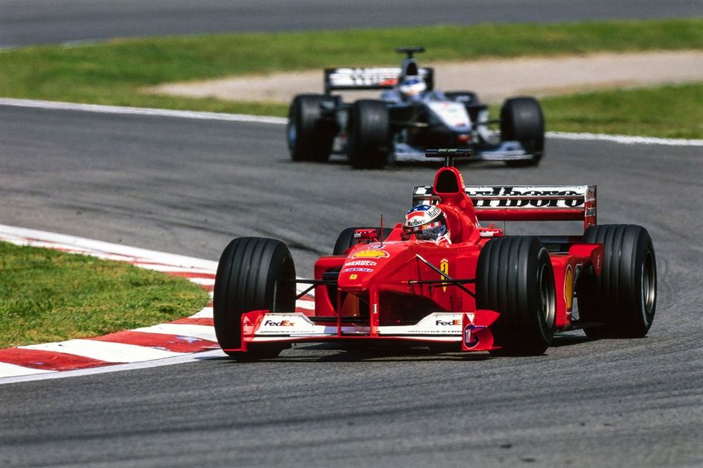 Michael Schumacher, Ferrari F1-2000, leads Mika H&auml;kkinen, McLaren MP4-15 Mercedes