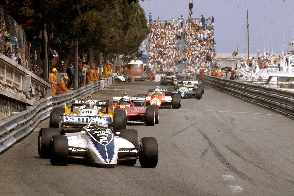 Riccardo Patrese, Brabham BT49D Ford leads Alain Prost, Renault RE30B, Didier Pironi, Ferrari 126C2 and Andre de Cesaris, Allfa Romeo 182