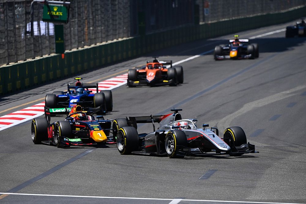 Marcus Armstrong, Hitech Grand Prix leads Dennis Hauger, Prema Racing