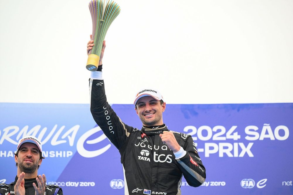 Race winner Mitch Evans , Jaguar TCS Racing holds up the trophy in celebration