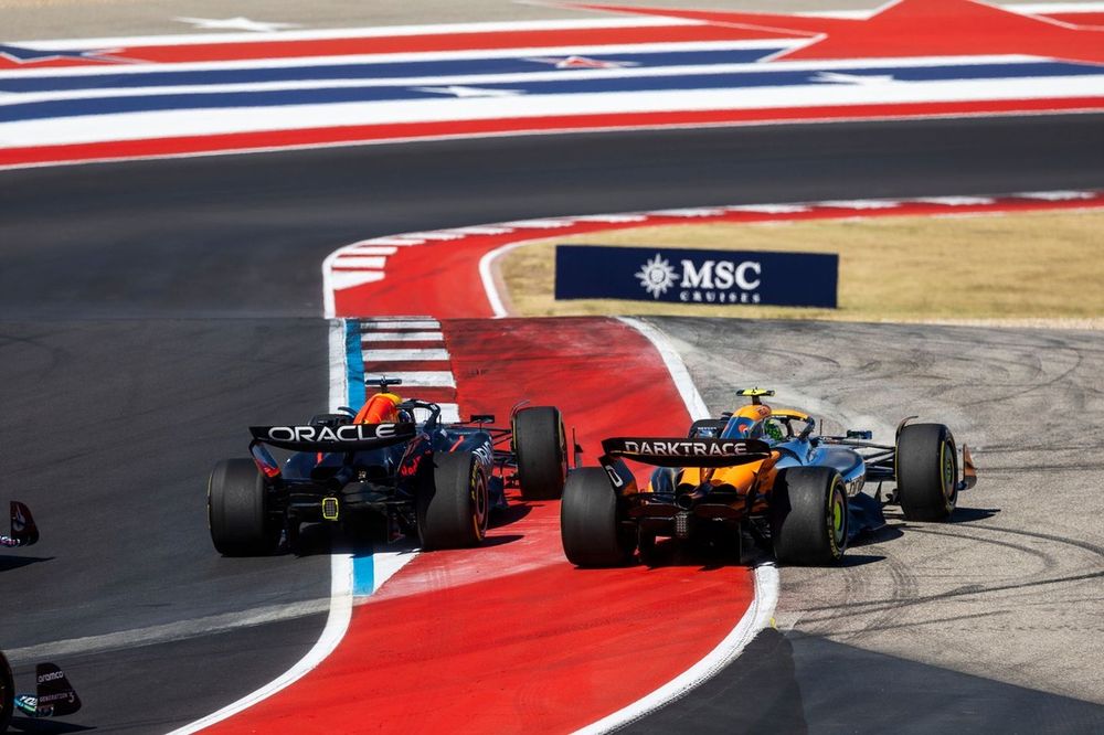 Max Verstappen, Red Bull Racing RB20, battles with Lando Norris, McLaren MCL38