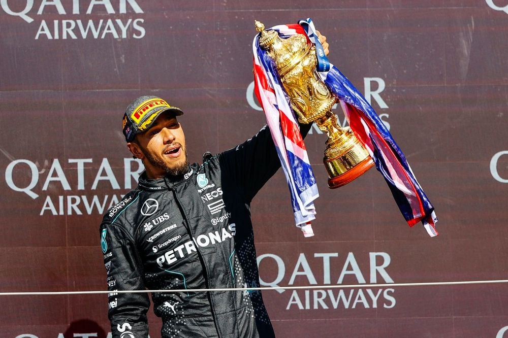 Lewis Hamilton, Mercedes-AMG F1 Team, 1st position, celebrates on the podium with the winners trophy