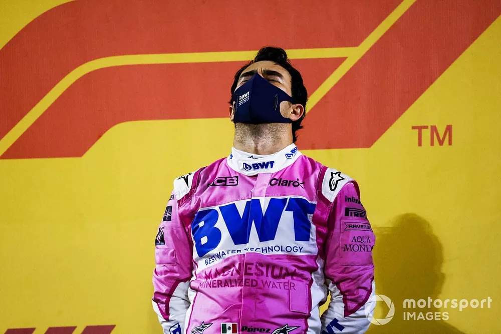 Sergio Perez, Racing Point, 1st position, celebrates on the podium