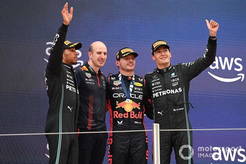 Lewis Hamilton, Mercedes-AMG, 2nd position, The Red Bull trophy delegate, Max Verstappen, Red Bull Racing, 1st position, George Russell, Mercedes-AMG, 3rd position, on the podium