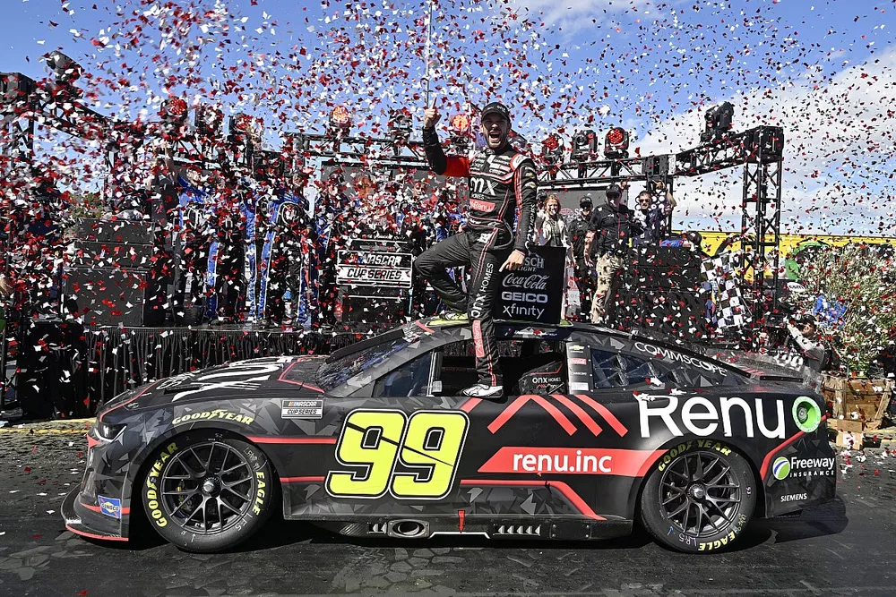 Daniel Suarez, TrackHouse Racing, Onx Homes / Renu Chevrolet Camaro celebrates his win