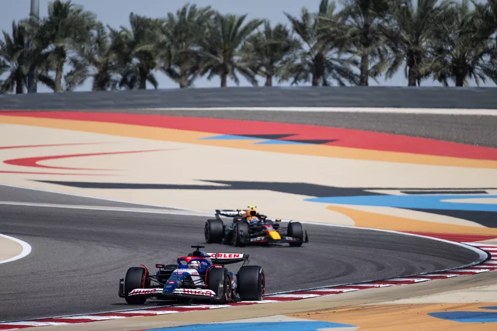 Daniel Ricciardo, RB F1 Team VCARB 01 and Sergio Perez, Red Bull Racing RB20 