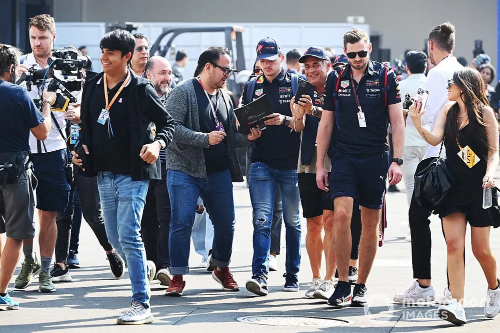 Max Verstappen, Red Bull Racing, signs autographs for fans