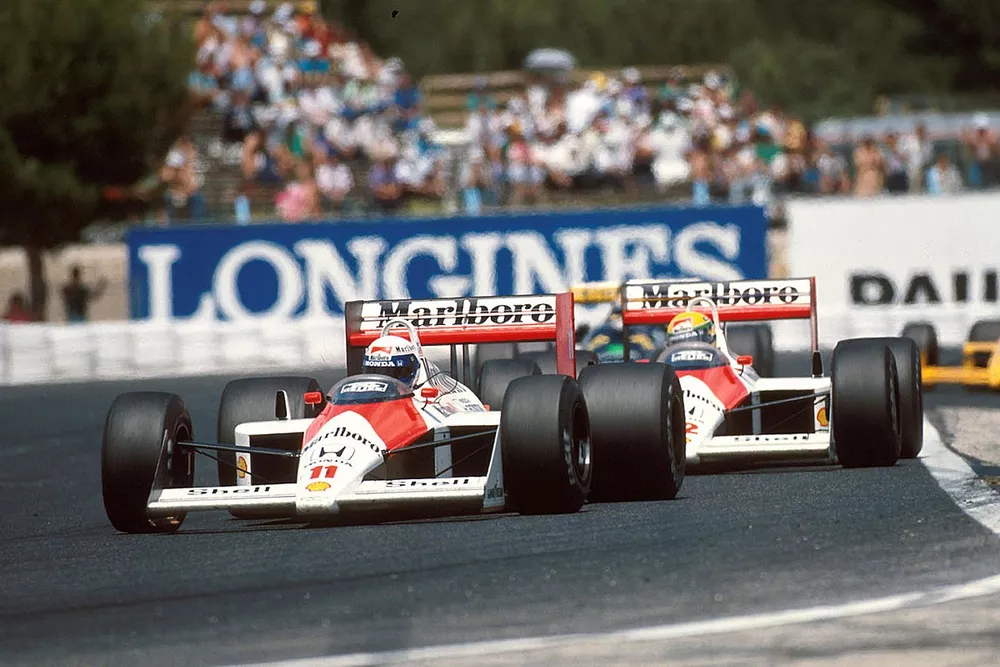 Alain Prost, McLaren MP4/4, leads his teammate Ayrton Senna, McLaren MP4/4