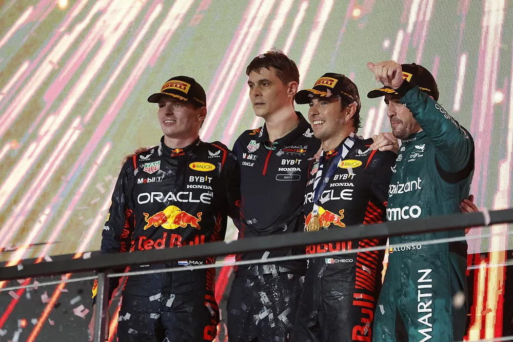 Max Verstappen, Red Bull Racing, 2nd position, Sergio Perez, Red Bull Racing, 1st position, and Fernando Alonso, Aston Martin F1 Team, 3rd position, on the podium