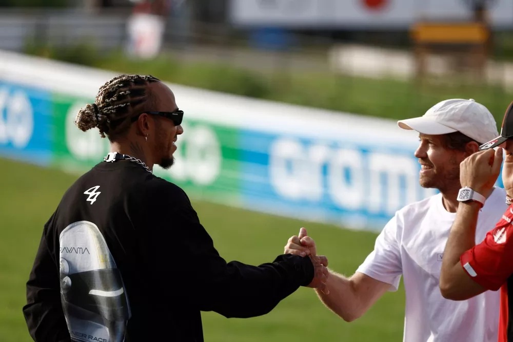 Drivers at turn two Buzzin biodiversity project Lewis Hamilton, Mercedes-AMG Sebastian Vettel