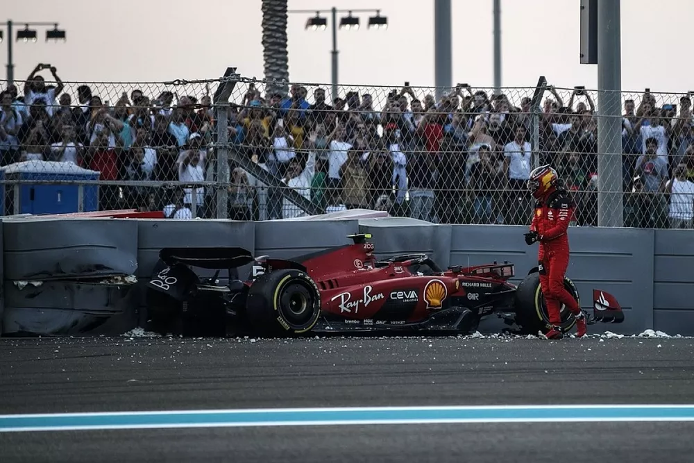 Carlos Sainz, Ferrari SF-23, climbs out of his damaged car after crashing out in FP2