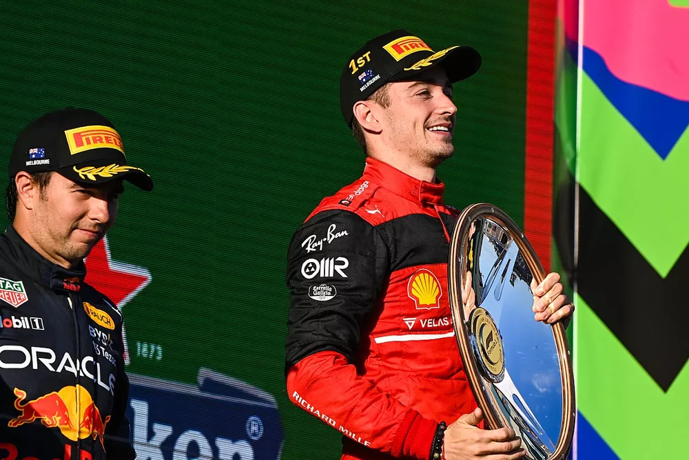 Charles Leclerc, Ferrari, 1st position, with his trophy