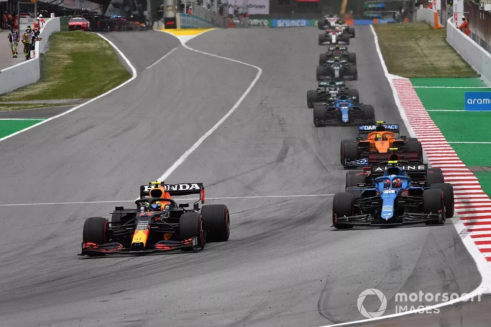Sergio Perez, Red Bull Racing RB16B, Esteban Ocon, Alpine A521, Lando Norris, McLaren MCL35M, and Fernando Alonso, Alpine A521
