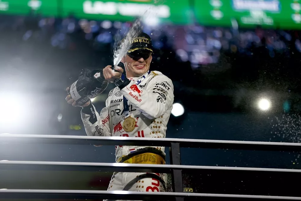 Max Verstappen, Red Bull Racing, 1st position, celebrates on the podium with Champagne