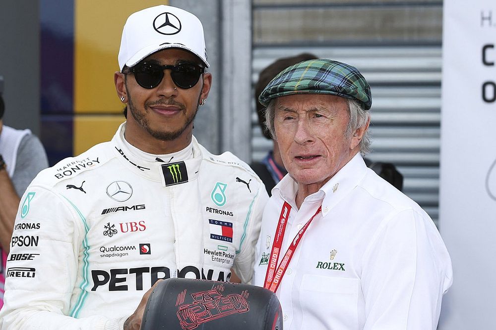 Lewis Hamilton, Mercedes AMG F1, celebrates pole position, and is presented with the Pirelli Pole Trophy by Jackie Stewart