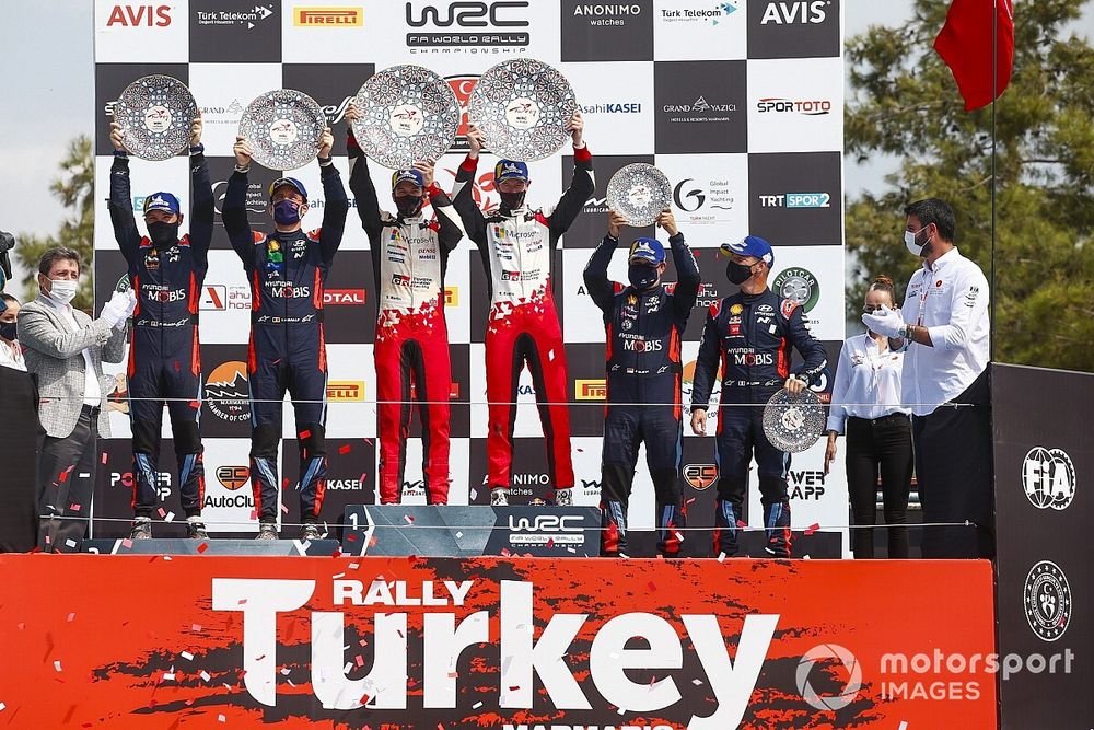 Podium: Race winner Elfyn Evans, Scott Martin, Toyota Gazoo Racing WRT Toyota Yaris WRC, second place Thierry Neuville, Nicolas Gilsoul, Hyundai Motorsport Hyundai i20 Coupe WRC, third place S&eacute;bastien Loeb, Daniel Elena, Hyundai Motorsport Hyundai i20 Coupe WRC