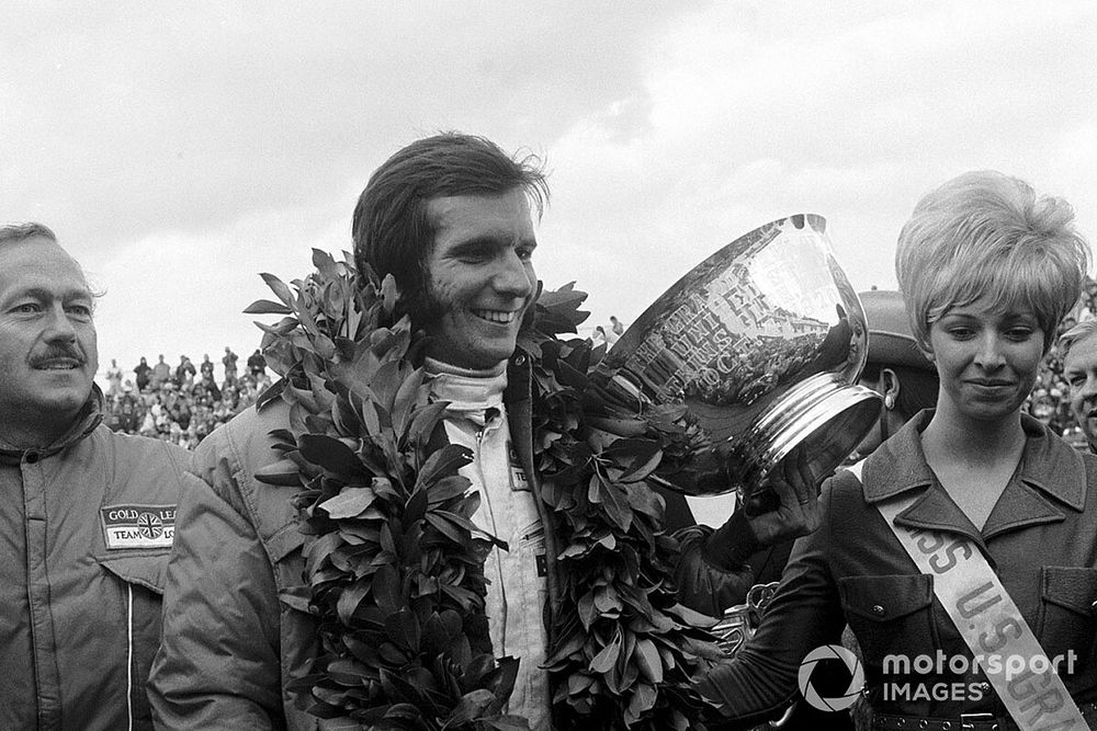 Emerson Fittipaldi, Lotus 72C, wins his first Grand Prix, and ensures Jochen Rindt is World Champion, here with lotus Boss, Colin Chapman
