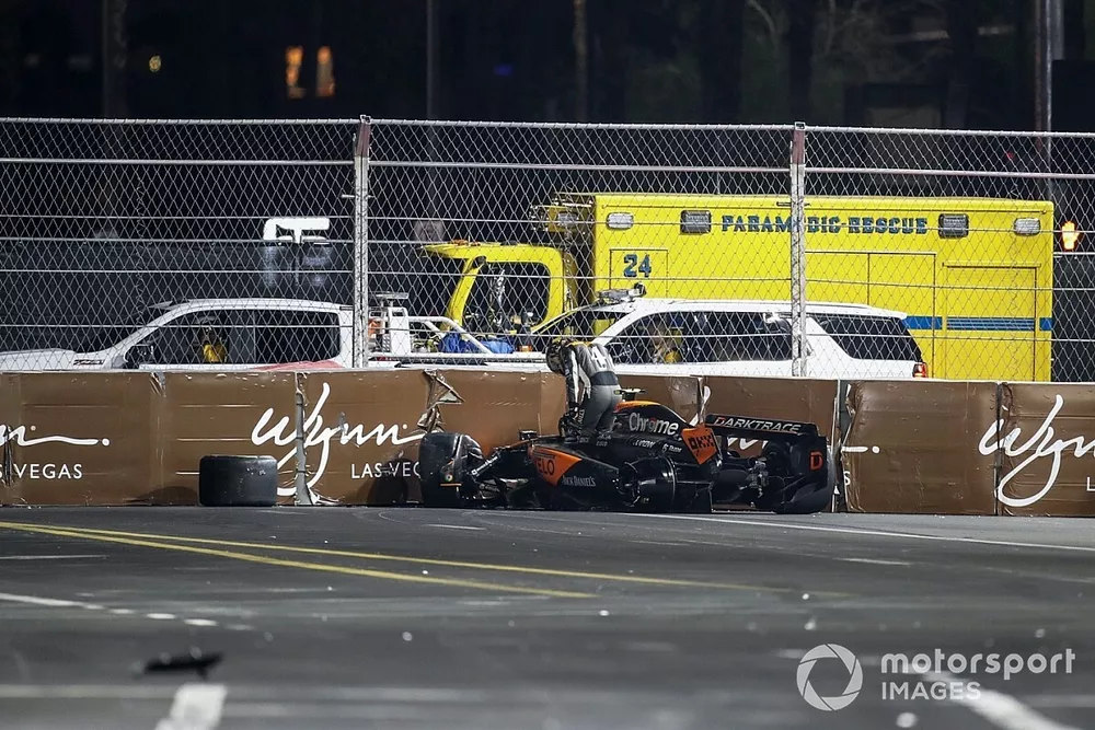 Lando Norris, McLaren MCL60, climbs out of his car after crashing out of the race