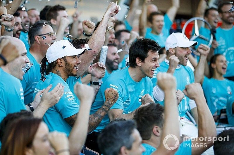 Valtteri Bottas, Mercedes AMG F1, 1st position, Lewis Hamilton, Mercedes AMG F1, 3rd position, and the Mercedes team celebrate after securing a win in the race and in the 2019 Constructors Championship